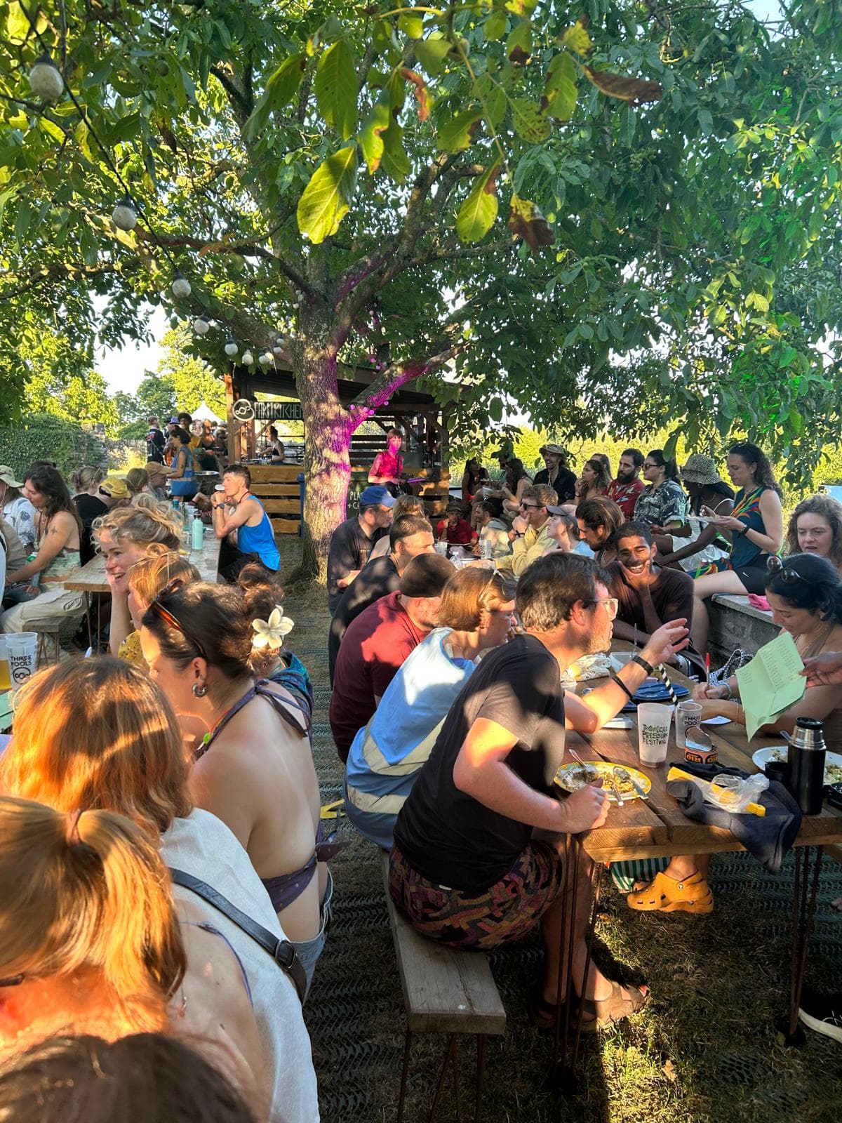 People sitting and eating communally